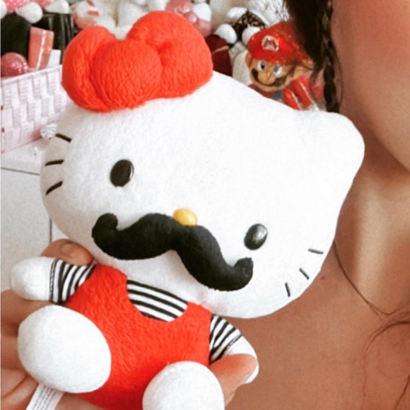 Hello kitty mustache plushie. Sanrio tag attached in great condition. - Picture 2 of 3